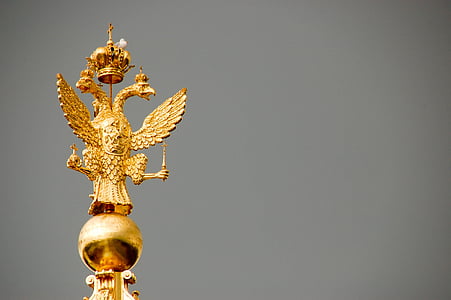 gold-colored bird figurine thumbnail