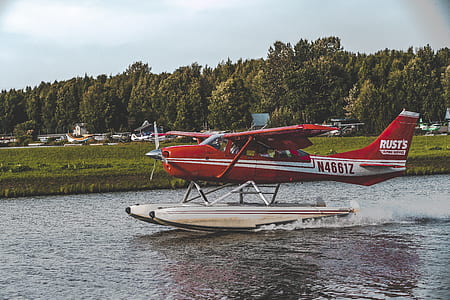 red and white airplane thumbnail