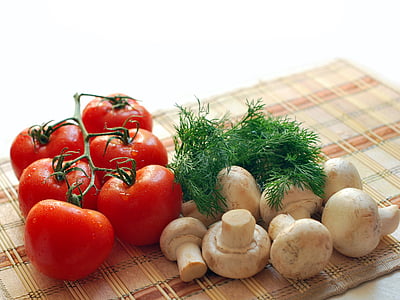 tomato fruit, mushroom and parsley on rolling mat thumbnail