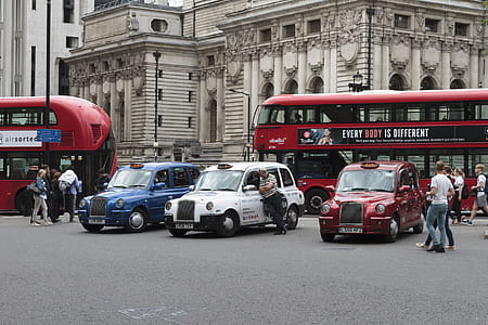 LONDON, UNITED KINGDOM - AUGUST 20, 2017 Taxis and buses waiting on fares in the London tourist district, taken on August 20, 2017 in London. thumbnail