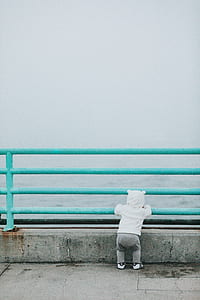 toddler's standing in front of bridge rail thumbnail