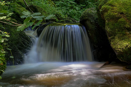 timelapse photography of waterfalls thumbnail