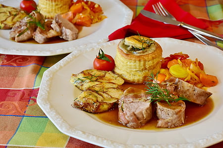 meat dish on white ceramic palte thumbnail