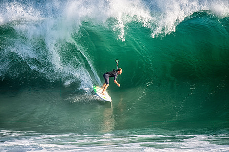 man on surfboard with wave thumbnail