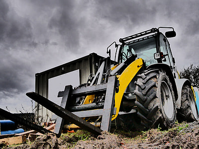 selective photography of forklift thumbnail