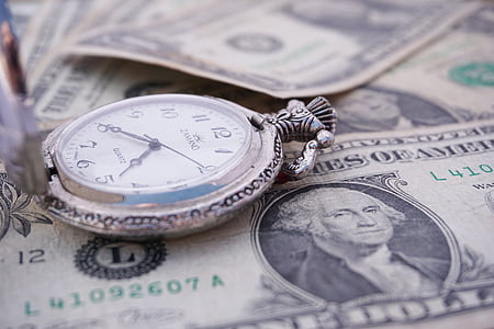 round silver-colored analog pocket watch at 4:40 thumbnail