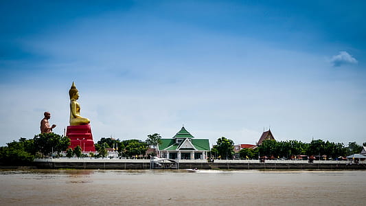 buddha Statue on waterfront thumbnail