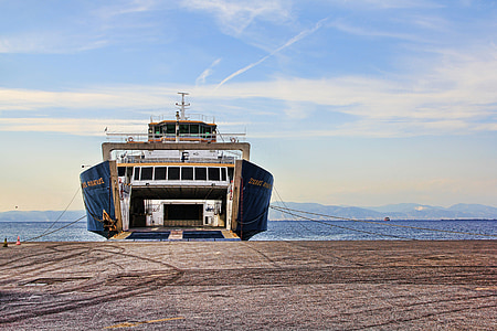 white and blue ship on body of watere thumbnail