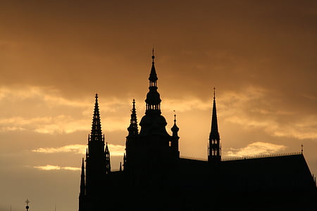 silhoutte of church during golden hour thumbnail