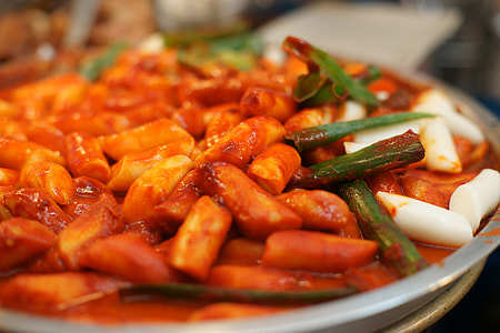 Tteokbokki, rice cakes with spicy gochujang sauce in South Korea thumbnail