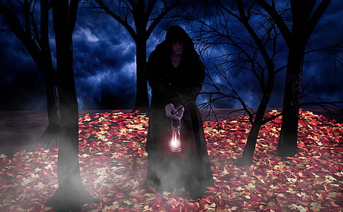 person wearing black cape photo thumbnail