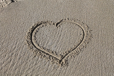 heart sand art photo during daytime thumbnail