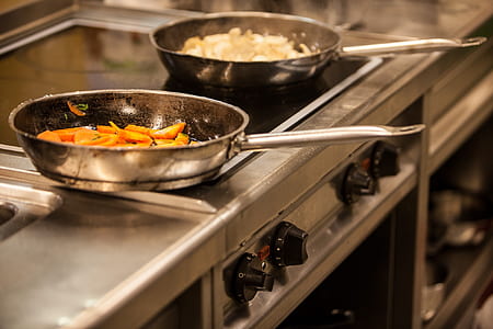 gray frying pan with stir carrots thumbnail