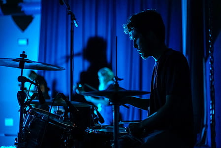 man sitting in the drum kit set thumbnail