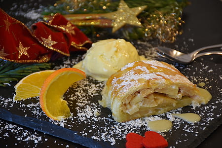 egg roll beside vanilla ice cream and sliced lemon thumbnail