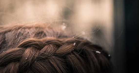 selective focus photography of braided hair thumbnail