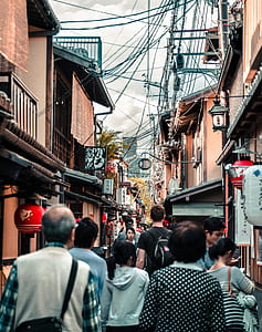 group of people walking on street thumbnail
