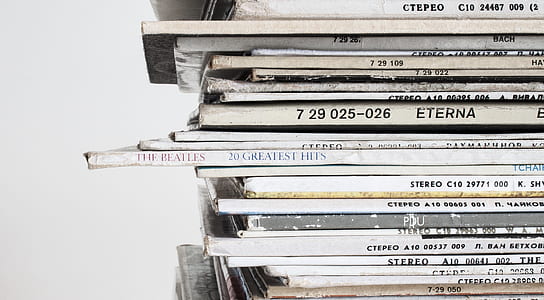 Piled Vinyl Records With White Background thumbnail
