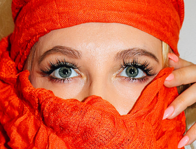 woman wearing red headdress thumbnail