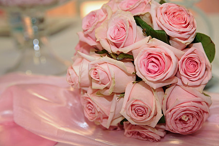 bouquet of pink flowers on pink surface thumbnail