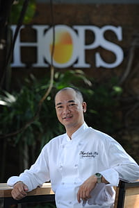 man in white chef uniform thumbnail