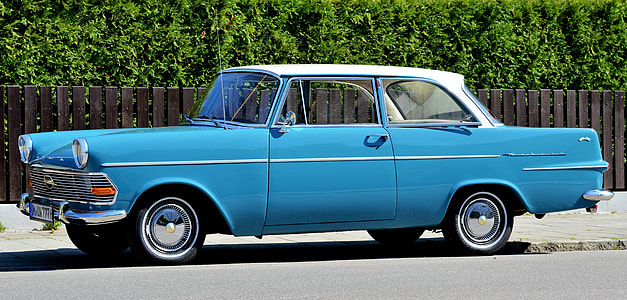 classic blue coupe on road thumbnail