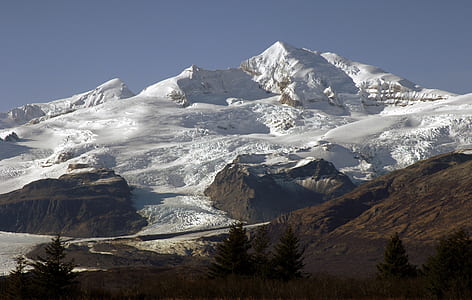 snow covered mountain at daytime thumbnail