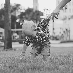 boy in grayscale photography thumbnail