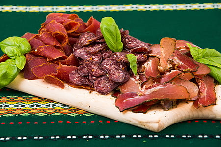 grilled meat on brown chopping board thumbnail