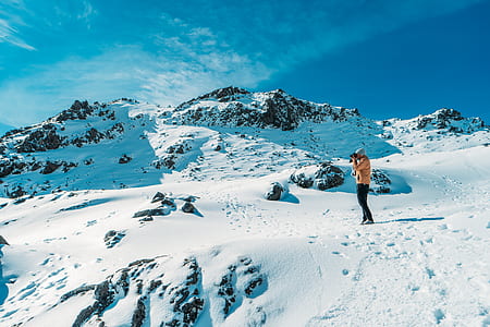 person at mountain alps thumbnail