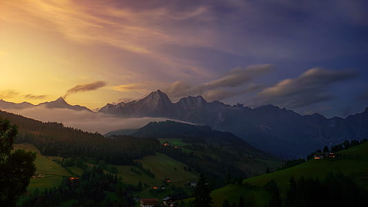 Aerial View Photography of Mountain Under Cloudy Sky thumbnail