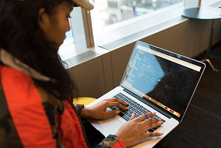 Woman Using Macbook Pro thumbnail