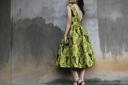 Photography of a Woman Wearing Green Dress thumbnail