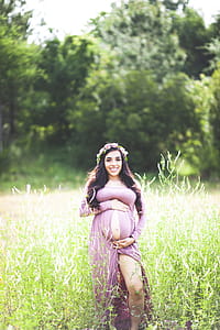 Photography of Pregnant Woman On Grass Field thumbnail