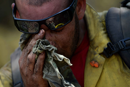 man wiping his right eye thumbnail