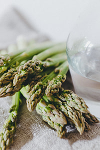 Green asparagus and a carafe with water thumbnail