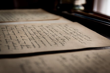 black and brown labeled paper photography thumbnail