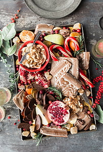 fruits and candy cane on stainless steel tray thumbnail
