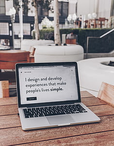 laptop computer showing text on white background thumbnail