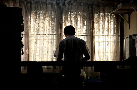 man facing window thumbnail