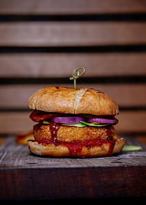 burger with onions, ketchup, and lettuce thumbnail