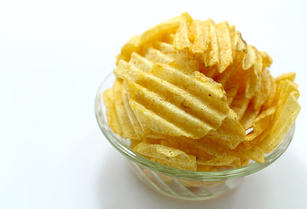 potato chips on clear glass bowl thumbnail