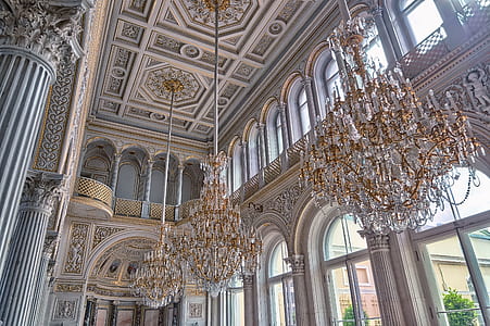 White Cathedral Hanging With Three Brown Uplight Chandelier thumbnail