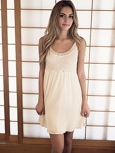 woman wearing white dress thumbnail