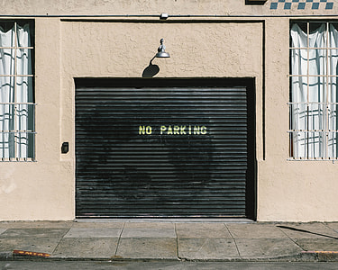 white steel garage door close thumbnail
