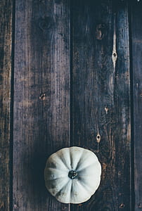 high-angle photography of green squash on brown wooden surface thumbnail