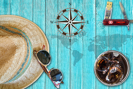 sun hat, sunglasses, and pocketknife flat lay photography thumbnail