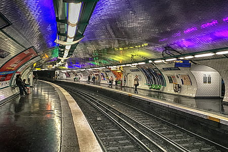 people walking in train station thumbnail