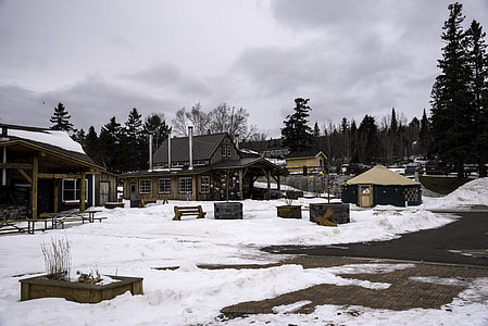 Shops, and buildings in the snowy winter in Grand Marais, Minnesota thumbnail