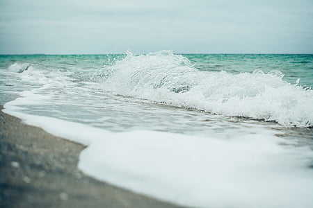selective focus photographed of ocean wave thumbnail